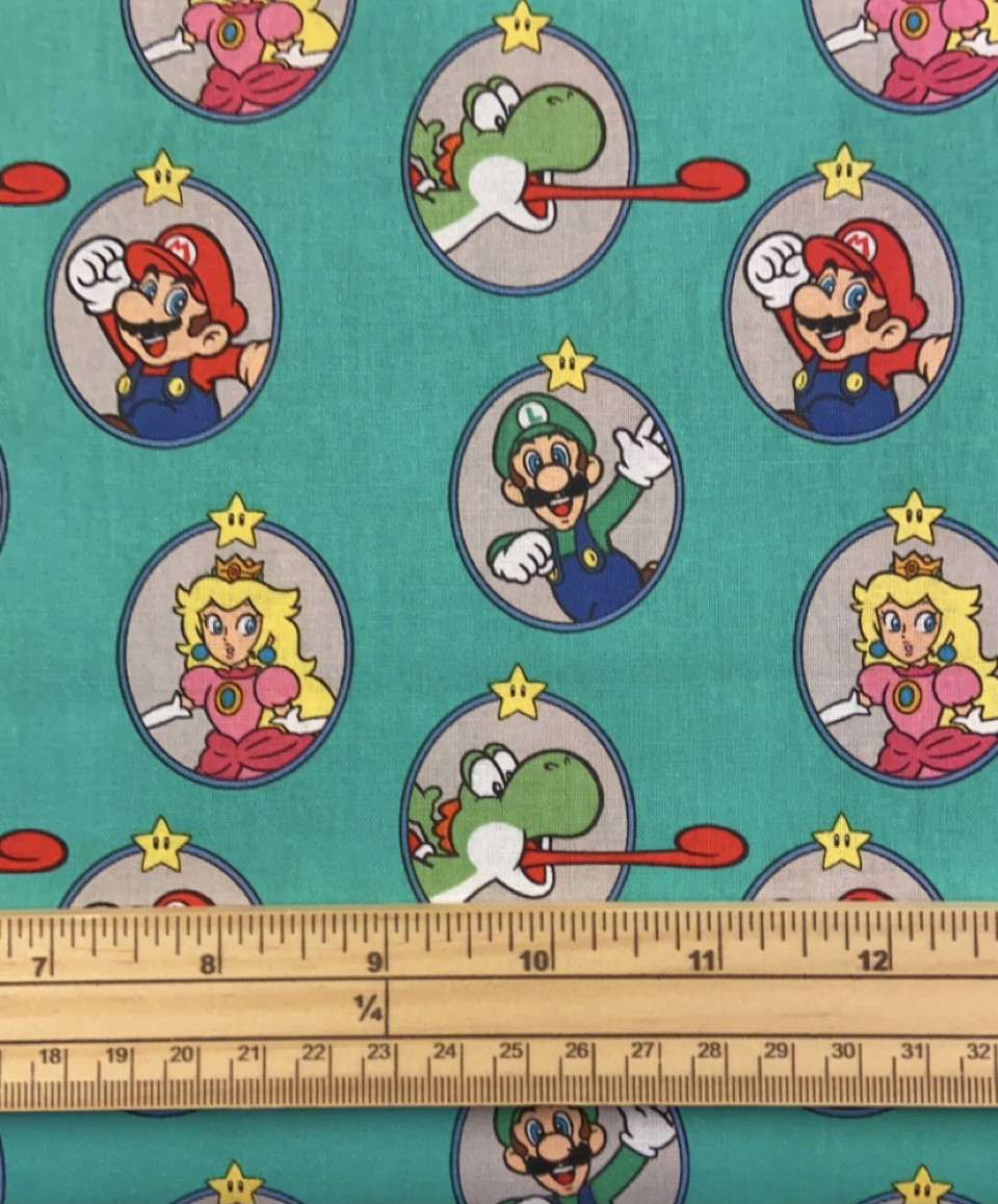 Fat Quarter Super Mario 2 Mario, Peaches, Luigi, Yoshi Badges On Teal 100% Cotton Quilting Fabric